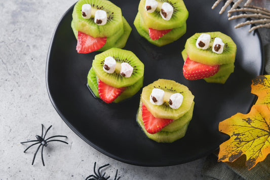 Spooky green kiwi monsters for Halloween Healthy Fruit Halloween Treats Halloween party 